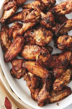 chicken wings on a white plate ready to be eaten