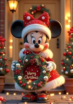 a mickey mouse holding a christmas wreath in front of a building with lights on it