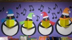 three penguins with hats and scarfs are standing in front of a purple wall decorated with musical notes