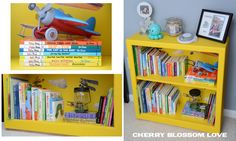 there is a yellow book shelf with many books on it and an airplane painted on the wall