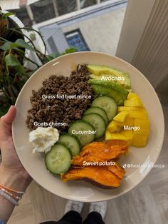 a white plate topped with different types of food