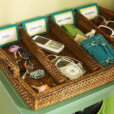 two wicker baskets filled with personal items on top of a table