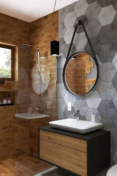 a modern bathroom with wooden walls and flooring