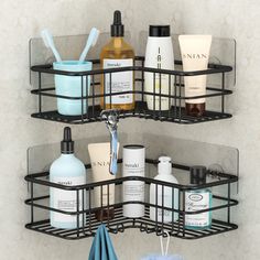 two black shelves with soap, lotion and other bathroom items