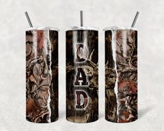 two tumblers with the words dad printed on them