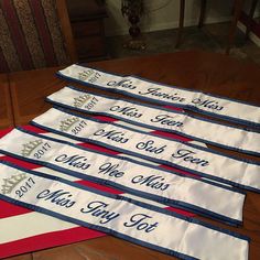 Pageant sashes / This sash is / White satin / Royal Blue Trim and thread / Remember the more lettering you put on the sash will depend on the lettering size being embroidered Personalize your sash all the way Thread color ? Font design from chart ? wording down the sash Crown color Metallic Silver or Gold satin color and Trim color from the drop down chart These sashes or so beautiful you will not be disappointed at all if you have any question please contact US in the conversation box WE will a Sash Design Ideas Pageant, Beauty Pageant Sashes, Jackie Sullivan, Beauty Pagents, Sash Ideas, Sash Design, Pageant Sashes, Glitz Pageant, Bedazzled Shoes