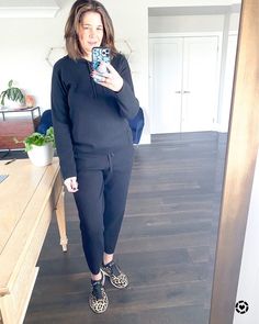 StyleDAHLIA on Instagram: “A cool pair of kicks takes this simple black sweater set to another level. Whole outfit is cozy and warm. Maybe not Texas snow warm but…” Black Sweater, Sweater Set