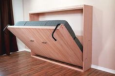 a bed that has been built using oak plywood and our full - size hardware kit