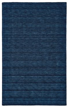 an area rug with dark blue colors