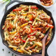 pasta with shrimp and peppers in a skillet