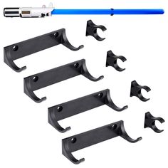 PRICES MAY VARY. Perfect Solution for Lightsaber Display: This horizontal lightsaber wall mounts come with 4 plastic hilt hooks and 4 plastic blade clips which will hold your saber securely and beautifully. Easy to Use: 1. Screw the hook and clip into the wall. 2. Put the hilt into the hook, and slip the blade into the clip. Hardware included. Sturdy: Thick plastic hook supports the weight of lightsaber. Durable plastic clip controls the blade not to fall. The kit is sturdy enough and can last f Lightsaber Wall Mount, Lightsaber Display, Star Wars Nursery, Nerd Cave, Lightsaber Hilt, Star Wars Decor, Star Wars Light Saber, Display Wall, Wall Mounts