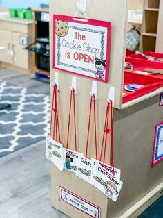 the cookie shop is open sign on display