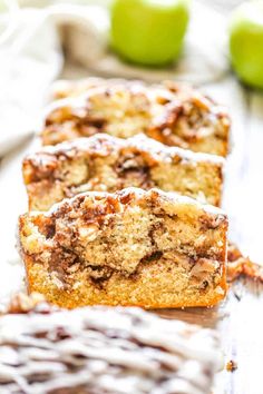 slices of apple coffee cake sitting on top of a table