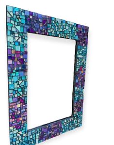 a blue and purple mosaic frame with a white background