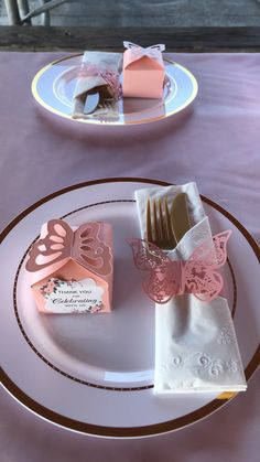 two plates with different types of chocolates on them, one is pink and the other is white