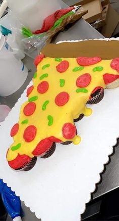 a cake shaped like a slice of pizza