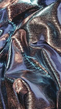 the fabric is shiny and blue in color