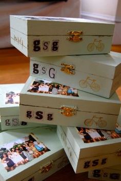 several wooden boxes stacked on top of each other with pictures in them and the words bsg written on them