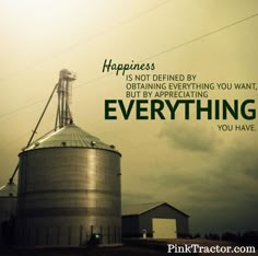 a grain silo with the quote happiness is not defined by obfacing everything you want, but by providing everything else