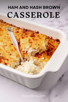 a casserole dish with hash browns in it and a serving spoon on the side