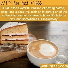 a cup of coffee next to a piece of cake