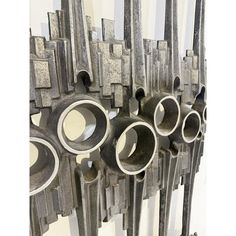 an art piece made out of metal pipes