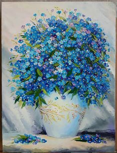 a painting of blue flowers in a white vase