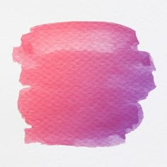 a pink watercolor stain on white paper