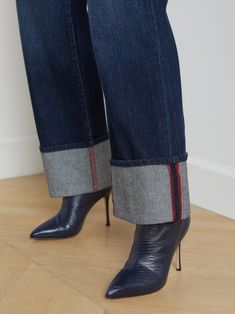 An ultra-high-rise cuffed wide-leg jean in premium all-cotton denim. True-blue wash with subtle high-low contrast and discrete distressing. Design comfortably hugs from just above natural waist through hip before draping into a wide flared leg that ends in a deep fold-up cuff. Contrast topstitching highlights five-pocket construction and zip fly closure. 100% Cotton. | L'AGENCE Miley Jean In Denmark High End Denim Fashion, Big Cuff Jeans, Cuffed Wide Leg Jeans, Wide Cuff Jeans, Cuff Jeans, Contrast Topstitching, Denim Projects, Fashion Themes, Cuffed Jeans