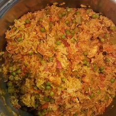 a large pan filled with food on top of a stove