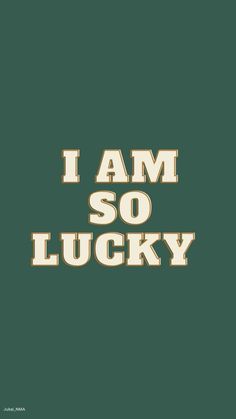 the words i am so lucky are in gold on a green background with white lettering