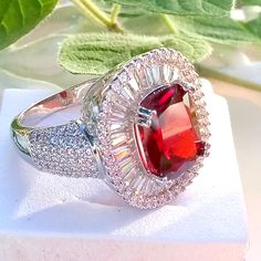 925 Silver Lab Created Red Ruby Fashion Ring. Princess Cut, Surround By Sparkling White Sapphires. Party Ruby Ring With Round Shape, Round Red Ruby Party Ring, Red Cubic Zirconia Ruby Ring For Formal Occasions, Red Ruby Ring With Cubic Zirconia For Formal Occasions, Classic Cubic Zirconia Ruby Ring, Red Dazzling Promise Ring, Dazzling Red Promise Ring, Silver Rings With Lab-created Ruby, Fine Jewelry Red Ruby Ring For Party