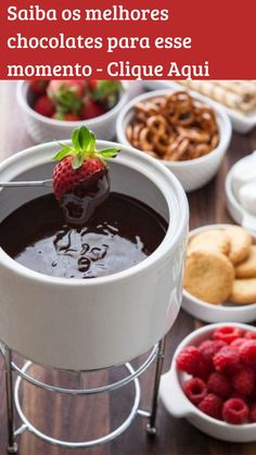 chocolate fondant with strawberries and pretzels in bowls on the table for dessert