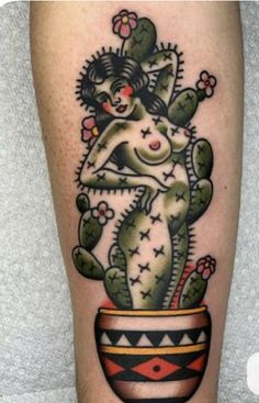 a cactus tattoo on the leg of a person with an image of a woman in a pot