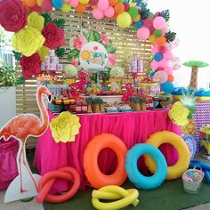 a flamingo themed birthday party with balloons and decorations