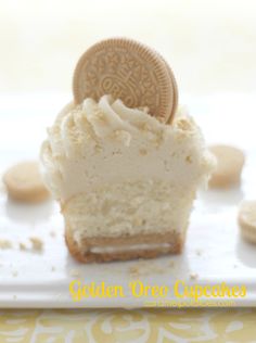 an oreo cookie and cream cheesecake on a white plate