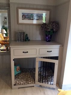 a dog bed in the corner of a room