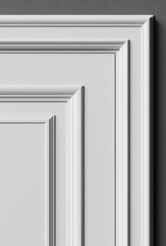 an image of a white cabinet door with black trimmings on the bottom and sides