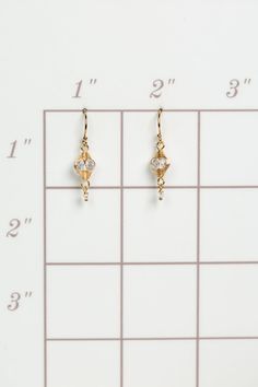 A beautiful gift for those born in April, featuring their birthstone of stunning quartz that is hand wrapped in gold filled wire. These feminine earrings dangle from gold filled earwires. Gold Filled (lead and nickel free) Quartz .75", on gold filled earwires We hand select our natural materials, thus there may be slight variations in color and/or size that will not detract from the overall aesthetic Our unique handcrafted designer jewelry for women is made in America, with each design created i Gold Wire Dangle Earrings, Gold Wire Wrapped Crystal Earrings For Wedding, Gold Plated Wire Wrapped Gold Earrings, Gold Wire Wrapped Earrings For Gift, Gold-plated Wire Wrapped Earrings, Gold Wire Wrapped Jewelry For Anniversary, Minimalist Wire Wrapped Crystal Earrings As Gift, Elegant Gold Wire-wrapped Crystal Earrings, Gold Crystal Drop Earrings For Everyday Wear