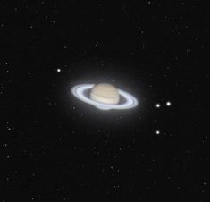 an artist's impression of saturn and its rings in the night sky with stars