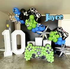 a video game themed birthday party with balloons and decorations