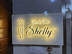 there is a sign that says mr and mrs shety on it in the bathroom