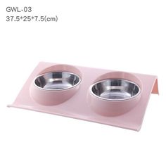 two bowls are shown on a pink tray