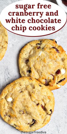 three white chocolate chip cookies with the words sugar free cranberry and white chocolate chip cookies