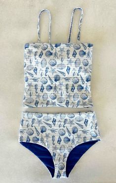 Textured seashell print modest swimsuit Clothes For Tropical Vacation, Cute Bathing Suit Ideas, Cute Tankini Aesthetic, Costal Swimsuit, Cute Appropriate Bikinis, Dream Clothes Preppy, Tankini And Shorts, Preppy Summer Bikinis, Cute Modest Bikinis For Teens Summer