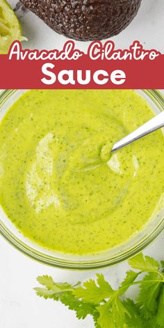 avocado and cilantro sauce in a glass bowl