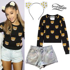 a girl wearing shorts and a sweater with teddy bears on it, next to the same outfit