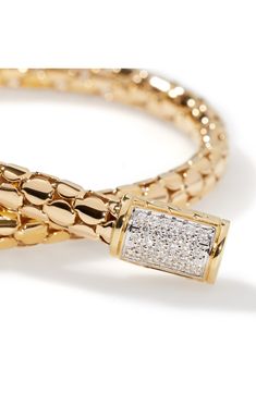 Polished 18-karat gold dots meet at a pavé diamond push-clasp on this handcrafted chain bracelet. Push-clasp closure Total diamond weight: 0.11ct. Color: G–H Clarity: S1 18k gold/diamond Imported >Diamond Guide Elegant Diamond Jewelry With Box Clasp, Yellow Gold Pave Setting Chain Bracelet, Yellow Gold Chain Bracelet With Pave Setting, Man Gold Bracelet Design, Mens Diamond Bracelet, Mens Bracelet Silver, Mens Gold Bracelets, Rollerball Perfume, Bracelets Gold Diamond