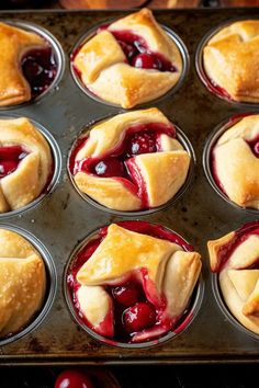 freshly baked cherry pies in muffin tins ready to be eaten for dessert