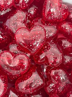 red heart shaped candies with glitter on them